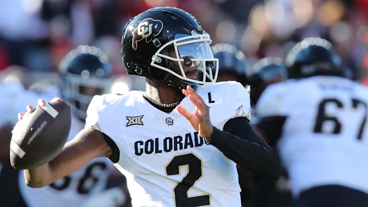 Nov 9, 2024; Lubbock, Texas, USA; Colorado Buffalos quarterback Shedeur Sanders (2) passes against the Texas Tech Red Raiders in the first half at Jones AT&T Stadium and Cody Campbell Field. Mandatory Credit: Michael C. Johnson-Imagn Images