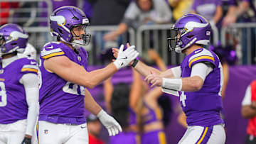 Minnesota Vikings tight end Johnny Mundt and quarterback Sam Darnold