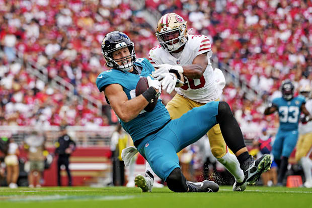 Jacksonville Jaguars tight end Hunter Long (84) catches a touchdown pass as San Francisco 49ers safety Marques Sigle (36) def