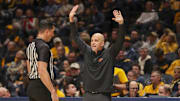 Jan 4, 2025; Morgantown, West Virginia, USA; Oklahoma State Cowboys head coach Steve Lutz argues a call during the first half against the West Virginia Mountaineers at WVU Coliseum. Mandatory Credit: Ben Queen-Imagn Images