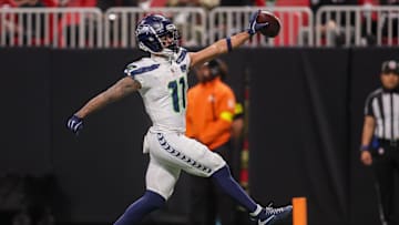 Dec 7, 2025; Atlanta, Georgia, USA; Seattle Seahawks wide receiver Jaxon Smith-Njigba (11) scores a touchdown against the Atlanta Falcons in the third quarter at Mercedes-Benz Stadium. Mandatory Credit: Brett Davis-Imagn Images