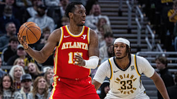 Atlanta Hawks forward Onyeka Okongwu (17) holds the ball against Indiana Pacers center Myles Turner (33) in the second half at Gainbridge Fieldhouse.