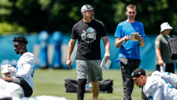 Detroit Lions head coach Dan Campbell watches practice 