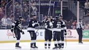 Dec 7, 2024; Los Angeles, California, USA;  Los Angeles Kings right wing Adrian Kempe (9) celebrates with teammates after scoring against the Minnesota Wild during the third period at Crypto.com Arena. Mandatory Credit: Ryan Sun-Imagn Images