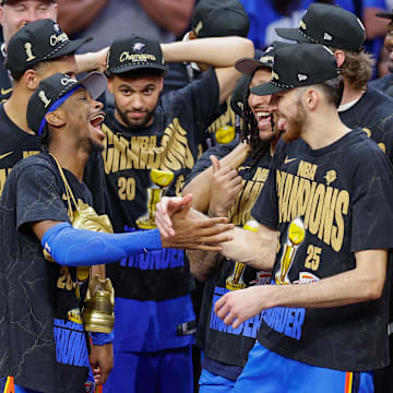 Jun 22, 2025; Oklahoma City, Oklahoma, USA; Oklahoma City Thunder guard Shai Gilgeous-Alexander (2) and Oklahoma City Thunder forward Chet Holmgren (7) celebrate after their team defeated the Indiana Pacers in game seven of the 2025 NBA Finals at Paycom Center. Mandatory Credit: Alonzo Adams-Imagn Images