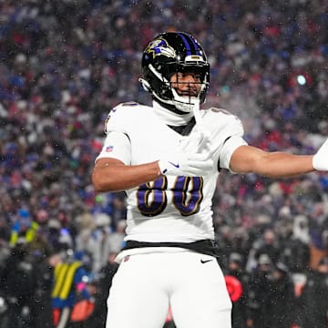 Jan 19, 2025; Orchard Park, New York, USA; Baltimore Ravens tight end Isaiah Likely (80) celebrates after making a catch during the first quarter against the Buffalo Bills in a 2025 AFC divisional round game at Highmark Stadium. Mandatory Credit: Gregory Fisher-Imagn Images