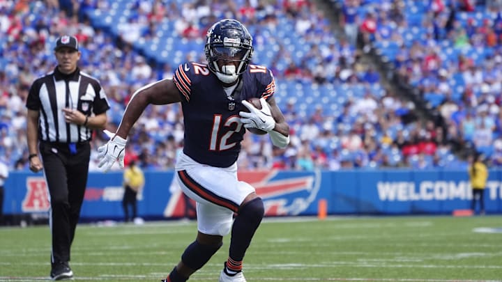 Aug 10, 2024; Orchard Park, New York, USA; Chicago Bears wide receiver Velus Jones Jr. (12) runs with the ball for a touchdown against the Buffalo Bills during the second half at Highmark Stadium. Mandatory Credit: Gregory Fisher-Imagn Images