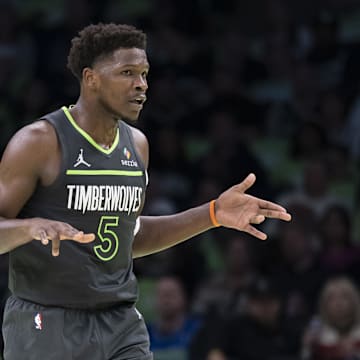 Nov 7, 2025; Minneapolis, Minnesota, USA; Minnesota Timberwolves guard Anthony Edwards (5) celebrates making a three-point shot against the Utah Jazz in the second half at Target Center. Mandatory Credit: Jesse Johnson-Imagn Images