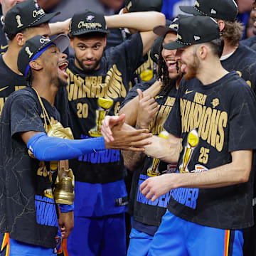 Jun 22, 2025; Oklahoma City, Oklahoma, USA; Oklahoma City Thunder guard Shai Gilgeous-Alexander (2) and Oklahoma City Thunder forward Chet Holmgren (7) celebrate after their team defeated the Indiana Pacers in game seven of the 2025 NBA Finals at Paycom Center. Mandatory Credit: Alonzo Adams-Imagn Images