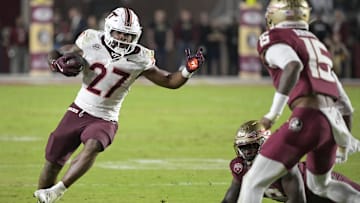 Nov. 15, 2025; Tallahassee, Fla.; Virginia Tech running back Marcellous Hawkins (27) runs the ball during the second half.