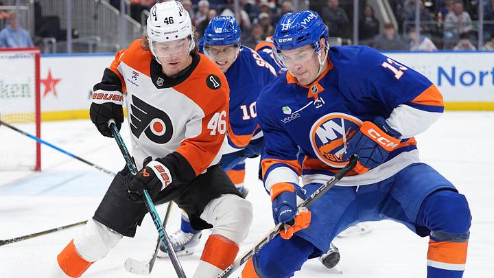 Apr 3, 2026; Elmont, New York, USA; Philadelphia Flyers forward Trevor Zegras (46) and New York Islanders fordward Mathew Barzal (13) battle for a puck during the third period at UBS Arena. Mandatory Credit: Alexander Wohl-Imagn Images Apr 3, 2026; Elmont, New York, USA; Philadelphia Flyers forward Trevor Zegras (46) and New York Islanders fordward Mathew Barzal (13) battle for a puck during the third period at UBS Arena. Mandatory Credit: Alexander Wohl-Imagn Images