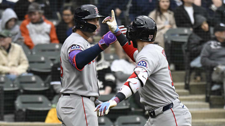 Apr 13, 2025; Chicago, Illinois, USA;  Boston Red Sox shortstop Trevor Story (10) high fives  first baseman  Triston Casas (36) after he hits a home run against the Chicago White Sox during the ninth inning at Guaranteed Rate Field. Mandatory Credit: Matt Marton-Imagn Images