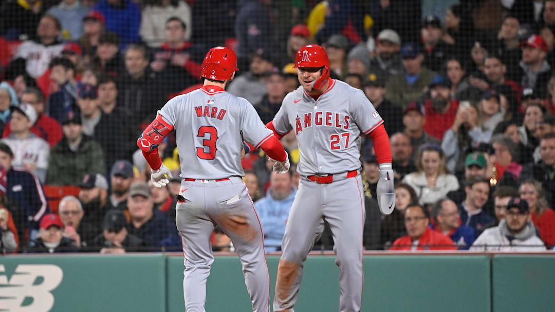 Apr 12, 2024; Boston, Massachusetts, USA; Los Angeles Angels left fielder Taylor Ward (3) celebrates his two run home run against the Boston Red Sox  with center fielder Mike Trout (27) during the sixth inning at Fenway Park. Mandatory Credit: Eric Canha-Imagn Images