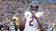 Chicago Bears wide receiver DJ Moore (2) scores a touchdown on a reception against the Green Bay Packers in the fourth quarter during their football game Sunday, January 5, 2025, at Lambeau Field in Green Bay, Wisconsin.