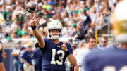 Notre Dame quarterback CJ Carr (13) warms up before a NCAA football game against Purdue at Notre Dame Stadium on Saturday, Sept. 20, 2025, in South Bend.