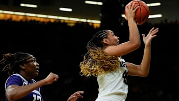 Iowa forward Hannah Stuelke (45) shoots against the Northwestern Wildcats Tuesday, Jan. 28, 2025 at Carver-Hawkeye Arena in Iowa City, Iowa.