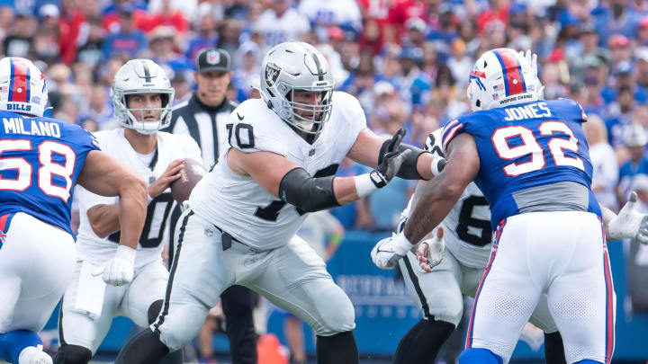 Sep 17, 2023; Orchard Park, New York, USA; Las Vegas Raiders guard Greg Van Roten (70) blocks Buffalo Bills defensive tackle DaQuan Jones (92) for quarterback Jimmy Garoppolo (10) in the second quarter at Highmark Stadium. Mandatory Credit: Mark Konezny-USA TODAY Sports