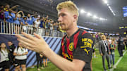 Jul 20, 2022; Houston, TX, USA; Manchester City midfielder Kevin De Bruyne (17), named the man of the match, claps his hand as he walks off the pitch after  defeating Club America at NRG Stadium in Houston, TX. Mandatory Credit: Thomas Shea-Imagn Images