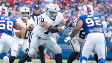 Sep 17, 2023; Orchard Park, New York, USA; Las Vegas Raiders guard Greg Van Roten (70) blocks Buffalo Bills defensive tackle DaQuan Jones (92) for quarterback Jimmy Garoppolo (10) in the second quarter at Highmark Stadium. Mandatory Credit: Mark Konezny-USA TODAY Sports