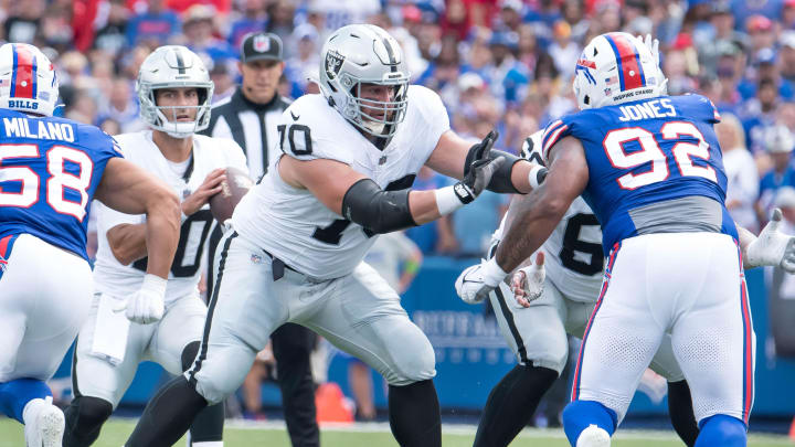 Sep 17, 2023; Orchard Park, New York, USA; Las Vegas Raiders guard Greg Van Roten (70) blocks Buffalo Bills defensive tackle DaQuan Jones (92) for quarterback Jimmy Garoppolo (10) in the second quarter at Highmark Stadium. Mandatory Credit: Mark Konezny-USA TODAY Sports