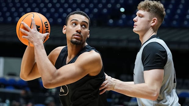 Purdue Boilermakers forward Trey Kaufman-Renn (4) practices with forward Sam King (7) Purdue Boilermakers forward Trey Kaufman-Renn (4) practices with forward Sam King (7)