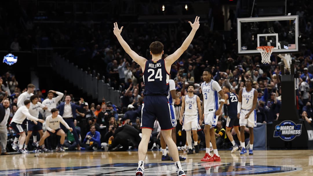 Mar 29, 2026; Washington, DC, USA; UConn Huskies guard Braylon Mullins (24) celebrates after making the game-winning three-point basket against the Duke Blue Devils in the second half during an Elite Eight game of the East Regional of the men's 2026 NCAA Tournament at Capital One Arena. Mandatory Credit: Geoff Burke-Imagn Images