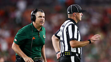 Sep 21, 2024; Tampa, Florida, USA; Miami Hurricanes head coach Mario Cristobal reacts to a play against the South Florida Bulls in the fourth quarter at Raymond James Stadium. Mandatory Credit: Nathan Ray Seebeck-Imagn Images