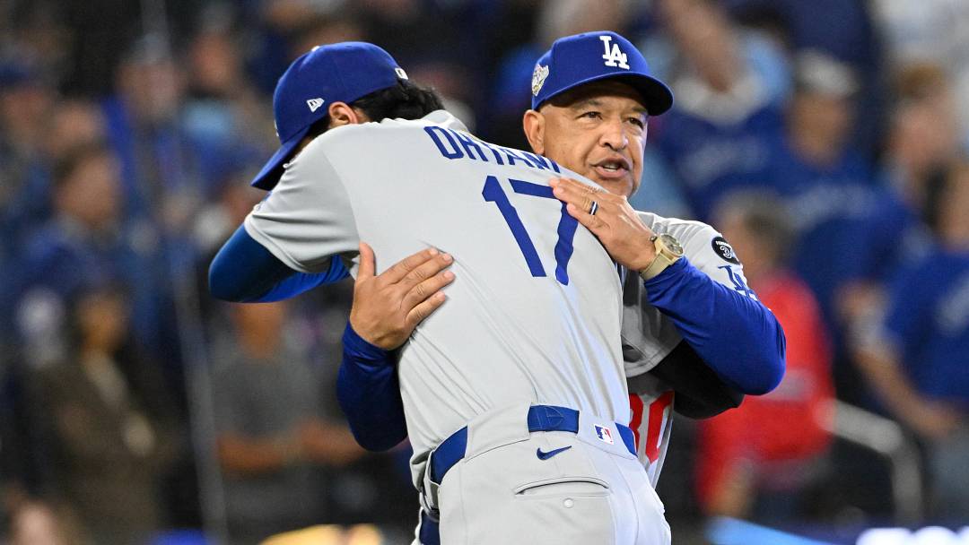 Oct 24, 2025; Toronto, Ontario, CAN; Los Angeles Dodgers designated hitter Shohei Ohtani (17) greets manager Dave Roberts (30) during player introductions prior to game one of the 2025 MLB World Series against the Toronto Blue Jays at Rogers Centre. Mandatory Credit: Dan Hamilton-Imagn Images Oct 24, 2025; Toronto, Ontario, CAN; Los Angeles Dodgers designated hitter Shohei Ohtani (17) greets manager Dave Roberts (30) during player introductions prior to game one of the 2025 MLB World Series against the Toronto Blue Jays at Rogers Centre. Mandatory Credit: Dan Hamilton-Imagn Images