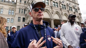 Apr 13, 2024; Hartford, CT, USA; UConn Huskies head coach Dan Hurley and his players leave the State Capitol to start the teams NCAA Mens Basketball Championship victory parade. Mandatory Credit: David Butler II-USA TODAY Sports