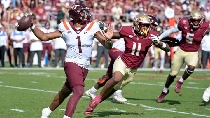 Oct 7, 2023; Tallahassee, Florida, USA; Virginia Tech Hokies quarterback Kyron Drones (1) looks to pass during the first half against the Florida State Seminoles at Doak S. Campbell Stadium. Mandatory Credit: Melina Myers-USA TODAY Sports