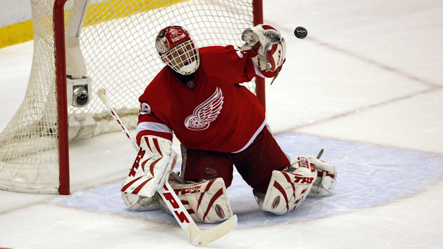 Dominik Hasek makes a save against the Blackhawks in 2008. | Leon Halip-Imagn Images