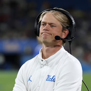 Sep 12, 2025; Pasadena, California, USA;  UCLA Bruins assistant head coach Jerry Neuheisel looks on during the second half against the New Mexico Lobos at Rose Bowl. Mandatory Credit: Kiyoshi Mio-Imagn Images