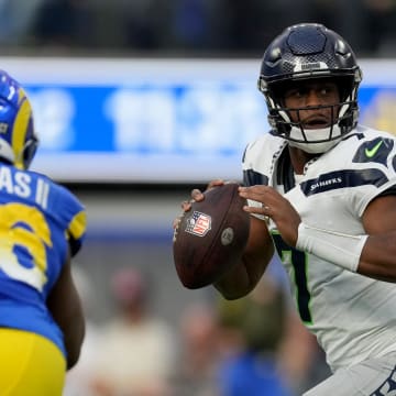 Nov 19, 2023; Inglewood, California, USA; Seattle Seahawks quarterback Geno Smith (7) looks to pass against the Los Angeles Rams in the second quarter at SoFi Stadium. Mandatory Credit: Kirby Lee-USA TODAY Sports