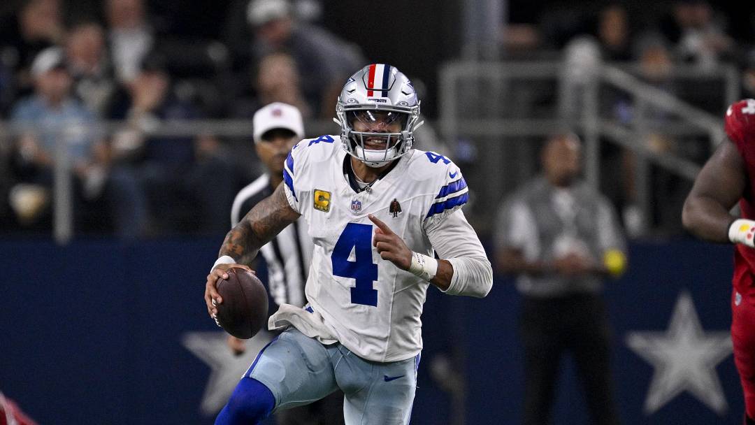 Nov 3, 2025; Arlington, Texas, USA; Dallas Cowboys quarterback Dak Prescott (4) runs with the ball during the game between the Dallas Cowboys and the Arizona Cardinals at AT&T Stadium. Mandatory Credit: Jerome Miron-Imagn Images