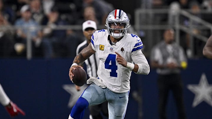 Nov 3, 2025; Arlington, Texas, USA; Dallas Cowboys quarterback Dak Prescott (4) runs with the ball during the game between the Dallas Cowboys and the Arizona Cardinals at AT&T Stadium. Mandatory Credit: Jerome Miron-Imagn Images