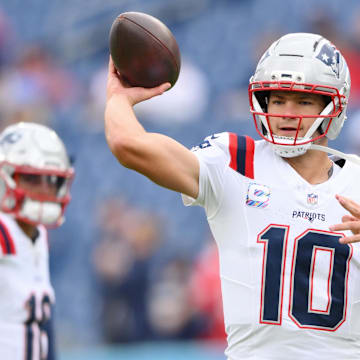 Oct 19, 2025; Nashville, Tennessee, USA; New England Patriots quarterback Drake Maye (10) warms up before the game between the New England Patriots and Tennessee Titans at Nissan Stadium. Mandatory Credit: Steve Roberts-Imagn Images