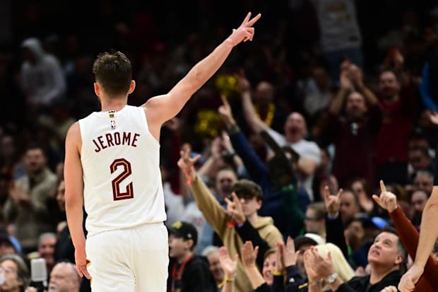 Ty Jerome (2) celebrates after hitting a three point basket