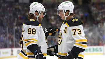 The Boston Bruins will be splitting the captaincy among David Pastrnak and Charlie McAvoy next season.
