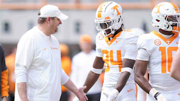 Tennessee head coach Josh Heupel greets players during warms up before the Orange & White spring game, Saturday, April 12, 2025.
