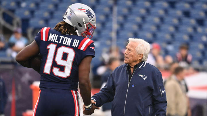 August 8, 2024; Foxborough, MA, USA; New England Patriots owner Robert Kraft talks to quarterback Joe Milton III (19) before a game against the Carolina Panthers at Gillette Stadium. Mandatory Credit: Eric Canha-USA TODAY Sports