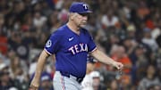 Sep 16, 2025; Houston, Texas, USA; Texas Rangers manager Bruce Bochy (15) walks to the mound for a pitching change during the fifth inning against the Houston Astros at Daikin Park.