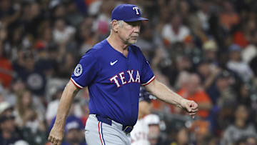 Sep 16, 2025; Houston, Texas, USA; Texas Rangers manager Bruce Bochy (15) walks to the mound for a pitching change during the fifth inning against the Houston Astros at Daikin Park.