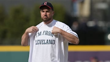 Apr 7, 2023; Cleveland, Ohio, USA; Kansas City Chiefs player Travis Kelce prepares to throw out the first pitch before the game between the Cleveland Guardians and the Seattle Mariners at Progressive Field. Mandatory Credit: Ken Blaze-Imagn Images