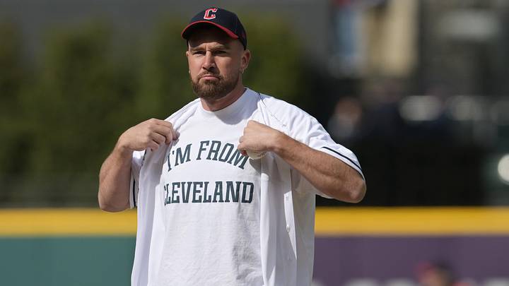 Apr 7, 2023; Cleveland, Ohio, USA; Kansas City Chiefs player Travis Kelce prepares to throw out the first pitch before the game between the Cleveland Guardians and the Seattle Mariners at Progressive Field. Mandatory Credit: Ken Blaze-Imagn Images