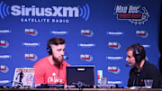 Jan 31, 2017; Houston, TX, USA; Sirius XC radio Mad Dog Unleashed host Christopher Russo (right) interviews Kansas City Chiefs tight end Travis Kelce on radio row at the Super Bowl LI  media center at the George R. Brown Convention Center.