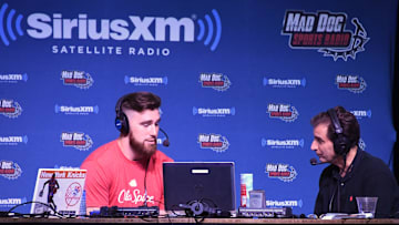 Jan 31, 2017; Houston, TX, USA; Sirius XC radio Mad Dog Unleashed host Christopher Russo (right) interviews Kansas City Chiefs tight end Travis Kelce on radio row at the Super Bowl LI  media center at the George R. Brown Convention Center.