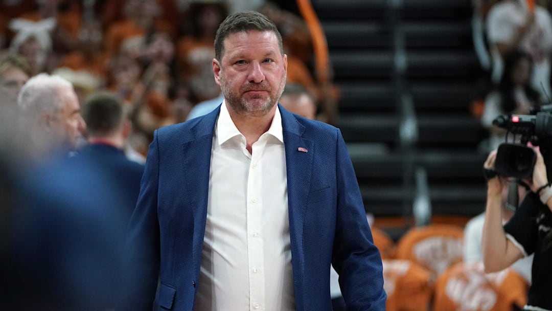 Ole Miss Rebels head coach Chris Beard enters the court before the start of the game against the Texas Longhorns at Moody Center. 