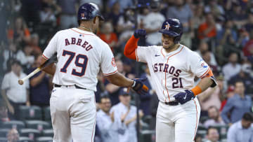 Jun 5, 2024; Houston, Texas, USA; Houston Astros designated hitter Yainer Diaz (21) celebrates with first baseman Jose Abreu (79) after hitting a home run during the fifth inning against the St. Louis Cardinals at Minute Maid Park. Mandatory Credit: Troy Taormina-USA TODAY Sports