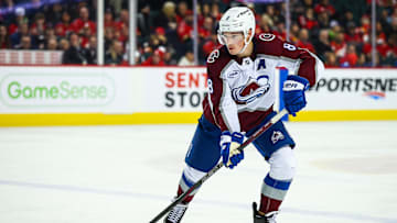 Feb 6, 2025; Calgary, Alberta, CAN; Colorado Avalanche defenseman Cale Makar (8) controls the puck against the Calgary Flames during the third period at Scotiabank Saddledome. Mandatory Credit: Sergei Belski-Imagn Images