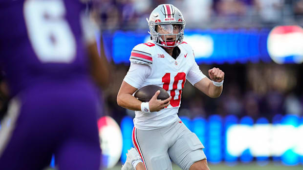 oregon ducks dante moore heisman trophy big ten college football quarterback dan lanning indiana hoosiers fernando mendoza